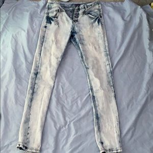 High waisted acid washed VIP jeans.